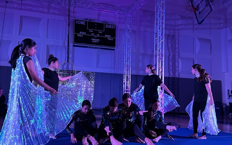 8th-grade students from The Cushman School performing acrobatics and aerial arts during the Centennial Circus Celebration with Miami Circus Arts professionals.