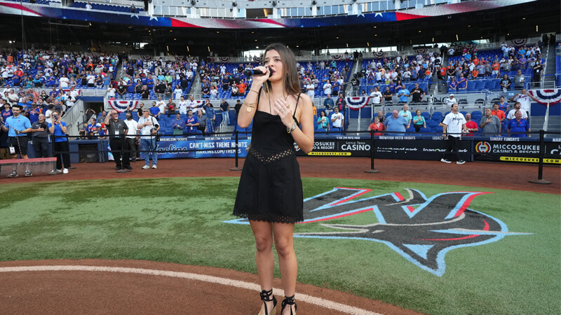 Alice Mooci Singing the National Anthem at a Marlins Game